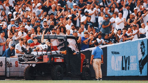 MLB Trending Images: Cameraman injured by wild pitch at Yankee Stadium, breaks eye socket